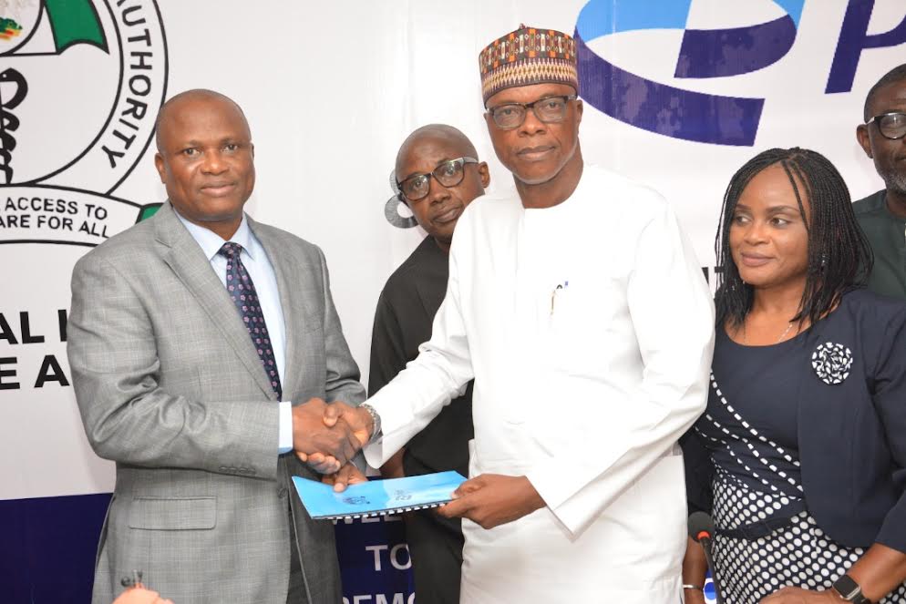 Officials of both parties during the signing of the MoU