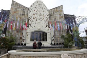 Australian tourists Gerry and Selina Dunstan visit the Bali Bombing Memorial Monument in Kuta, Bali, Indonesia, on Oct. 4, 2022. Two decades after a few Bali bombings, counterterrorism efforts in the world’s most populous Muslim country remain highly active. More than 2,300 people have been arrested on terrorism charges, according to the Center for Radicalism and Deradicalization Studies, since a national counterterrorism unit, known as Densus 88, was established in the wake of the attacks. (AP Photo/Firdia Lisnawati)