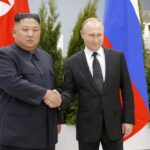 FILE – Russian President Vladimir Putin, right, and North Korea’s leader Kim Jong Un shake hands during their meeting in Vladivostok, Russia, April 25, 2019. As North Korea conducts more powerful weapons tests — and threatens pre-emptive nuclear strikes on Washington and Seoul — it may be taking inspiration from the fiery rhetoric of the leader of a nuclear-armed member of the U.N. Security Council: Russia’s Vladimir Putin. (AP Photo/Alexander Zemlianichenko, Pool, File)