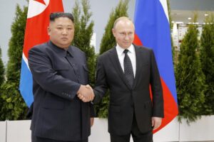 FILE – Russian President Vladimir Putin, right, and North Korea’s leader Kim Jong Un shake hands during their meeting in Vladivostok, Russia, April 25, 2019. As North Korea conducts more powerful weapons tests — and threatens pre-emptive nuclear strikes on Washington and Seoul — it may be taking inspiration from the fiery rhetoric of the leader of a nuclear-armed member of the U.N. Security Council: Russia’s Vladimir Putin. (AP Photo/Alexander Zemlianichenko, Pool, File)