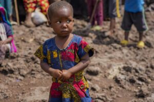 Pasika Bagerimana’s daughter Mahigwe stands outside a temporary shelter she shares with others who fled fighting, in Nyiragongo, Democratic Republic of Congo, Aug. 31, 2022. Bagerimana, who lost two children to hunger, worries her remaining two children might be next. “Hunger is killing people,” she says. Hunger is soaring across parts of Congo’s war-torn North Kivu province where the fighting between M23 rebels and government soldiers has been raging since March, according to aid workers, civilians and health workers. (AP Photo/Sam Mednick)