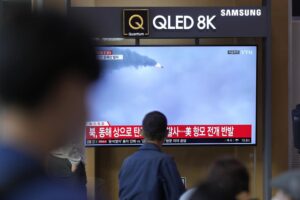 A TV screen showing a news program reporting about North Korea’s missile launch with file footage, is seen at the Seoul Railway Station in Seoul, South Korea, Thursday, Oct. 6, 2022. North Korea launched two ballistic missiles toward its eastern waters on Thursday, as the United States redeployed one of its aircraft carriers near the Korean Peninsula in response to the North’s recent launch of a powerful missile over Japan. (AP Photo/Lee Jin-man)