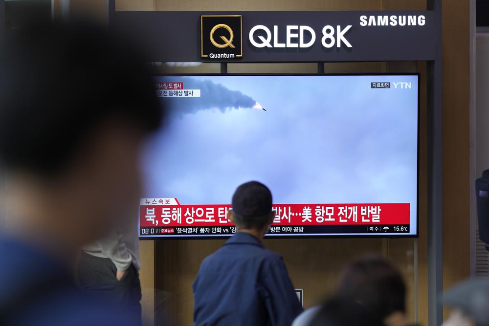 A TV screen showing a news program reporting about North Korea’s missile launch with file footage, is seen at the Seoul Railway Station in Seoul, South Korea, Thursday, Oct. 6, 2022. North Korea launched two ballistic missiles toward its eastern waters on Thursday, as the United States redeployed one of its aircraft carriers near the Korean Peninsula in response to the North’s recent launch of a powerful missile over Japan. (AP Photo/Lee Jin-man)