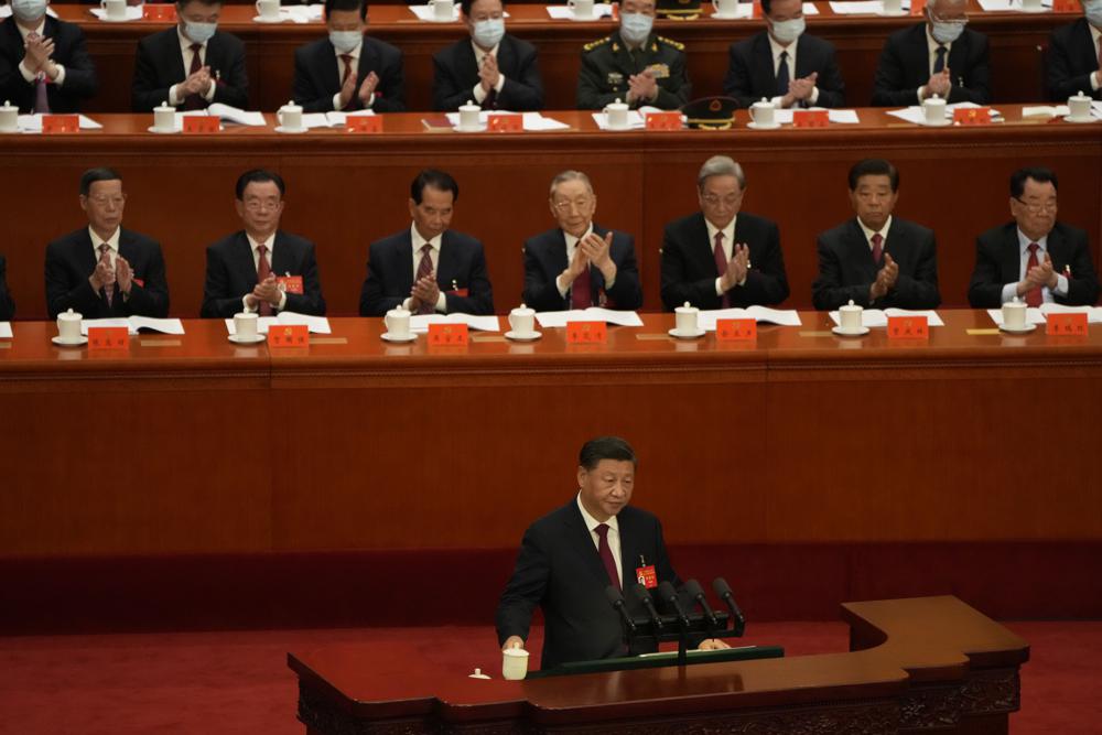 Chinese President Xi Jinping delivers a speech at the opening ceremony of the 20th National Congress of China’s ruling Communist Party held at the Great Hall of the People in Beijing, China, Sunday, Oct. 16, 2022. China on Sunday opens a twice-a-decade party conference at which leader Xi Jinping is expected to receive a third five-year term that breaks with recent precedent and establishes himself as arguably the most powerful Chinese politician since Mao Zedong. (AP Photo/Mark Schiefelbein)
