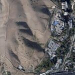 This satellite photo from Planet Labs PBC shows Evin prison in Tehran, Iran, Sunday, Oct. 16, 2022, after a fire at the complex amid ongoing national protests in the country. Iran’s judiciary raised the death toll Monday, Oct. 17, 2022, in a blaze at the prison, saying that at least eight prisoners were killed. (Planet Labs PBC via AP)