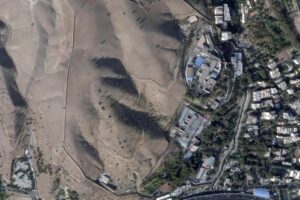 This satellite photo from Planet Labs PBC shows Evin prison in Tehran, Iran, Sunday, Oct. 16, 2022, after a fire at the complex amid ongoing national protests in the country. Iran’s judiciary raised the death toll Monday, Oct. 17, 2022, in a blaze at the prison, saying that at least eight prisoners were killed. (Planet Labs PBC via AP)