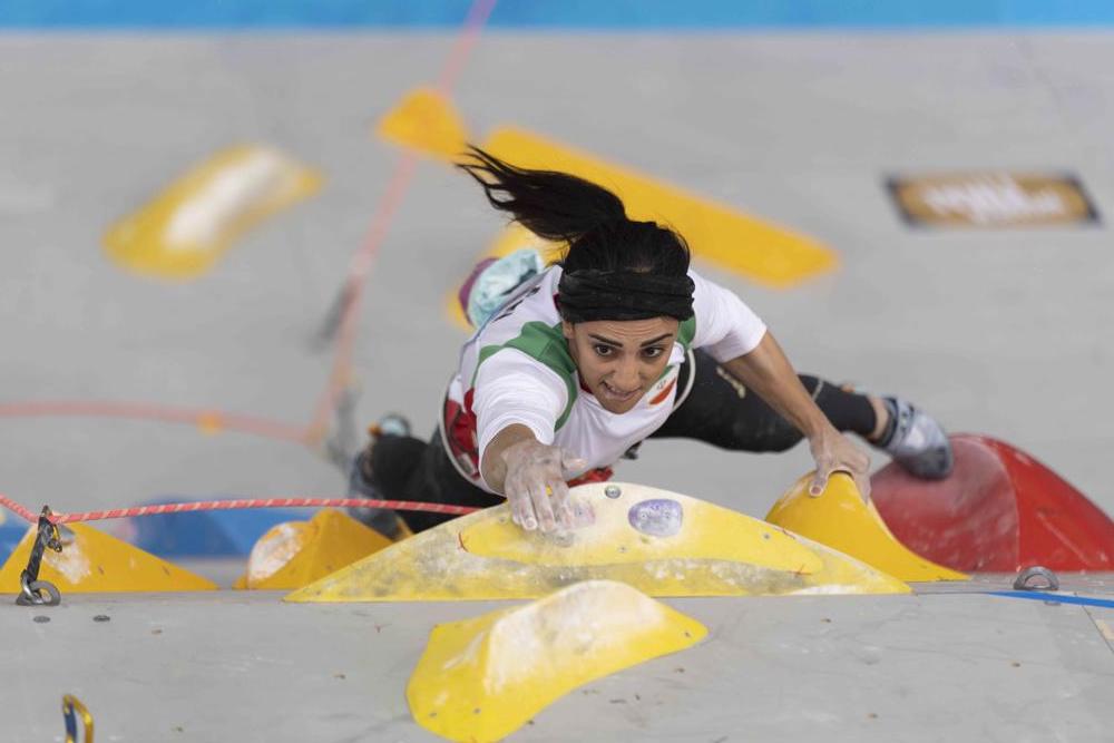 Iranian athlete Elnaz Rekabi competes during the women’s Boulder & Lead final during the IFSC Climbing Asian Championships, in Seoul, Sunday, Oct. 16, 2022. Rekabi left South Korea on Tuesday, Oct. 18, 2022 after competing at an event in which she climbed without her nation’s mandatory headscarf covering, authorities said. Farsi-language media outside of Iran warned she may have been forced to leave early by Iranian officials and could face arrest back home, which Tehran quickly denied. (Rhea Khang/International Federation of Sport Climbing via AP)