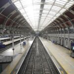 Empty platforms are seen at Paddington train station during a 24-hour strike by four transportation trade unions, in London, Saturday, Oct. 1, 2022. Trains in Britain all but ground to a halt Saturday as coordinated strikes by rail workers added to a week of turmoil caused by soaring energy prices and unfunded tax cuts that roiled financial markets. (James Manning/PA via AP)