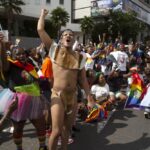 Members of the LGTBQ community take part in a Pride march in Sandton, Johannesburg, Saturday, Oct. 29, 2022. (AP Photo/Denis Farrell)