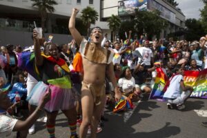 Members of the LGTBQ community take part in a Pride march in Sandton, Johannesburg, Saturday, Oct. 29, 2022. (AP Photo/Denis Farrell)