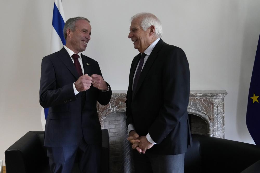 European Union foreign policy chief Josep Borrell, right, speaks with Israel’s Minister of Intelligence Elazar Stern during a bilateral meeting prior to the EU-Israel Association Council at the EU Council building in Brussels on Monday, Oct. 3, 2022. (AP Photo/Virginia Mayo)