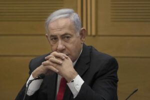 FILE – Former Israeli Prime Minister Benjamin Netanyahu speaks to right-wing opposition party members, at the Knesset, Israel’s parliament, in Jerusalem, June 14, 2021. Netanyahu was hospitalized on Wednesday, Oct. 5, 2022, after feeling unwell during the Jewish fasting day of Yom Kippur. (AP Photo/Maya Alleruzzo, File)