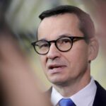 FILE – Poland’s Prime Minister Mateusz Morawiecki speaks with the media as he arrives for an EU summit in Brussels on Oct. 21, 2022. Morawiecki said late Friday, Oct. 28, 2022 that Poland’s nuclear energy project will use the “reliable, safe technology” of Westinghouse Electric Company, saying a strong Poland-U.S. alliance “guarantees the success of our joint initiatives.” (AP Photo/Olivier Matthys, File)