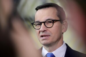 FILE – Poland’s Prime Minister Mateusz Morawiecki speaks with the media as he arrives for an EU summit in Brussels on Oct. 21, 2022. Morawiecki said late Friday, Oct. 28, 2022 that Poland’s nuclear energy project will use the “reliable, safe technology” of Westinghouse Electric Company, saying a strong Poland-U.S. alliance “guarantees the success of our joint initiatives.” (AP Photo/Olivier Matthys, File)