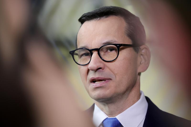 FILE – Poland’s Prime Minister Mateusz Morawiecki speaks with the media as he arrives for an EU summit in Brussels on Oct. 21, 2022. Morawiecki said late Friday, Oct. 28, 2022 that Poland’s nuclear energy project will use the “reliable, safe technology” of Westinghouse Electric Company, saying a strong Poland-U.S. alliance “guarantees the success of our joint initiatives.” (AP Photo/Olivier Matthys, File)