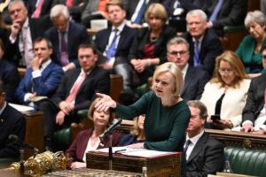 In this handout photo provided by UK Parliament, Britain’s Prime Minister Liz Truss speaks during Prime Minister’s Questions in the House of Commons in London, Wednesday, Oct. 12, 2022. (Jessica Taylor/UK Parliament via AP)