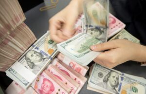 Chinese Yuan weakens to 7.1668 against dollar
