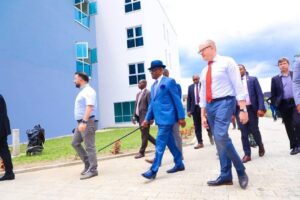Rivers Governor Nyesom Wike (c), US Consul General Will Stevens (r)