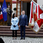 Canadian Defence Minister Anand and her Polish counterpart Blaszczak review honor guard during welcoming ceremony in Warsaw