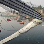 TOPSHOT-INDIA-ACCIDENT-BRIDGE-0_1667205287472_1667205287472_1667205304028_1667205304028