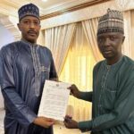 Sani Shaba’an submitting his letter of resignation at his ward.