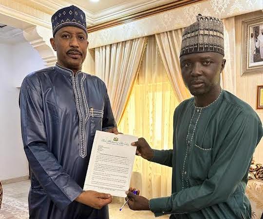 Sani Shaba’an submitting his letter of resignation at his ward.