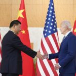 U.S. President Joe Biden, right, shakes hands with Chinese President Xi Jinping before their meeting on the sidelines of the G20 summit meeting, Monday, Nov. 14, 2022, in Nusa Dua, in Bali, Indonesia. (AP Photo/Alex Brandon)