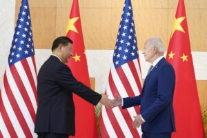 U.S. President Joe Biden, right, shakes hands with Chinese President Xi Jinping before their meeting on the sidelines of the G20 summit meeting, Monday, Nov. 14, 2022, in Nusa Dua, in Bali, Indonesia. (AP Photo/Alex Brandon)