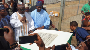 Minister of Police Affairs, Alhaji Maigari Dingyadi representing President Muhammadu Buhari