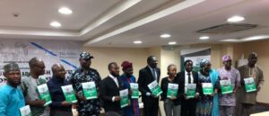 Stakeholders across sectors with the compendium at the public presentation