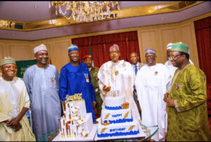 President Muhammadu Buhari flanked by SGF Mr. Boss Mustapha, Chief of Staff Prof Ibrahim Gambari, Permanent Secretary State House, Tijjani Umar, SSAP Malam Garba Shehu and SCOP Amb Lawan Kazaure  during his 80th Birthday at the Presidential Villa Abuja.