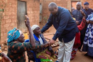 Barr. Caleb Mutfwang sympathizing with grieving family