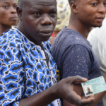 Voters-holding-PVC