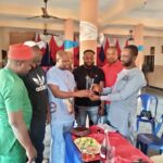 The delegation presenting award to Odogwu