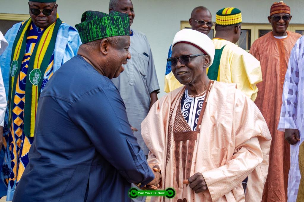 Caleb Mutfwang with traditional ruler