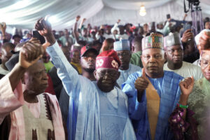 Bola Ahmed Tinubu reacts after he was declared winner in Nigeria’s presidential election at the Party’s campaign headquarters, in Abuja