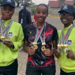 NUGA 2022 Badminton medallist Aminat Ilori (right) will represent Nigeria in China and her teammates, showing off their medals at UNIBEN