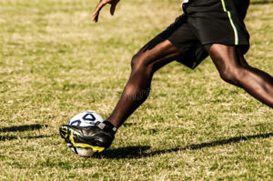 soccer-player-legs-action-51871244