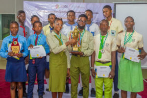 Winner of debate competition Molan High School and five other participating schools in Lagos