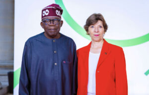 Nigerian President Bola Tinubu (L) French Minister of Europe and Foreign Affairs Catherine Colonna (R)