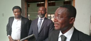 Mba Ukweni (left) with some members of his team after a court session in Calabar