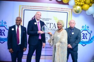 L- R: Head of Assessment M,  Akin Alufa; Headmaster, Mr Labuschagne; Proprietress, Mrs Amsa AbdulRazaq; and Senior Teacher, Mr Joe Dyer; at the presentation of BSO Inspection Report that awarded The Regent School, Abuja, outstanding in all categories