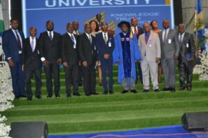 Prof Okebukola (middle) with Prof Tayo flanked by management staff of BU