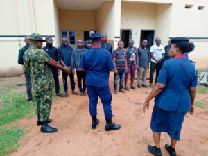 Suspects being handed over to the officials of NSCDC Delta State Command at the weekend