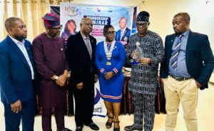Presentation of award to the Guest Speaker Otunba Bola Onabadejo at the membership seminar organised by Rotary Club of Akowonjo, Lagos
