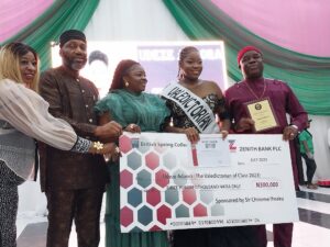 The Valedictorian receiving her cash reward