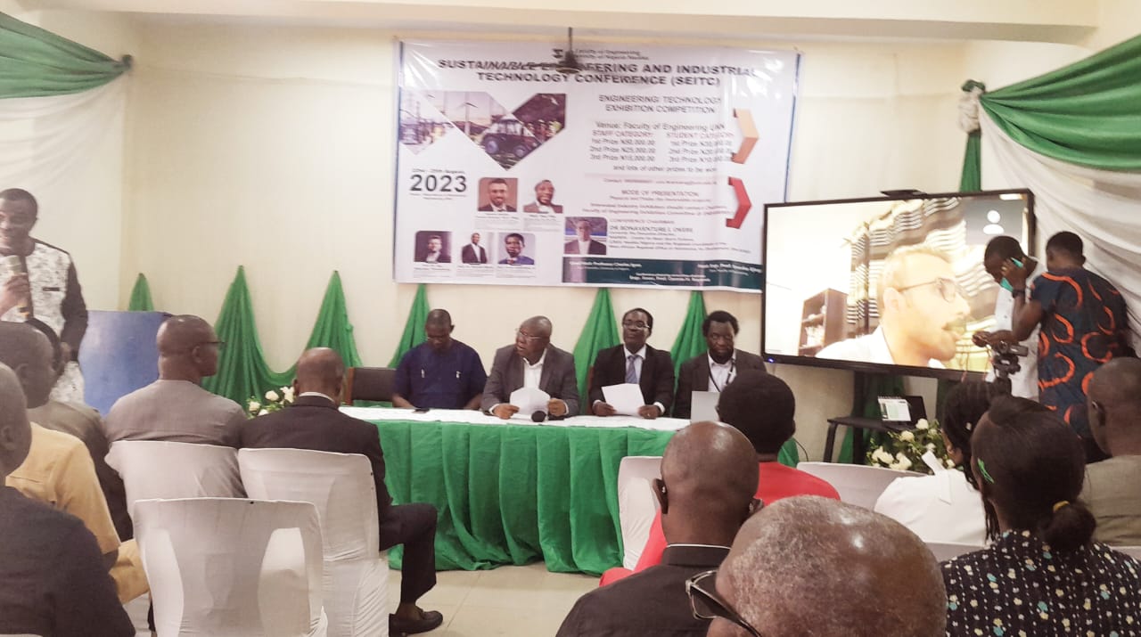 UNN VC and other participants inspecting students and staff research work exhibitions