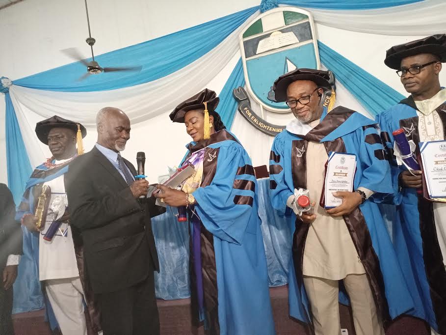 Fellows of CPSS (with Ex-commissioner Kene-Uyanwune receiving a plaque from Emeritus Prof. Mark Anikpo)