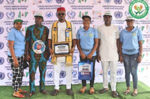 The Awardee with some some staff members of his Foundation