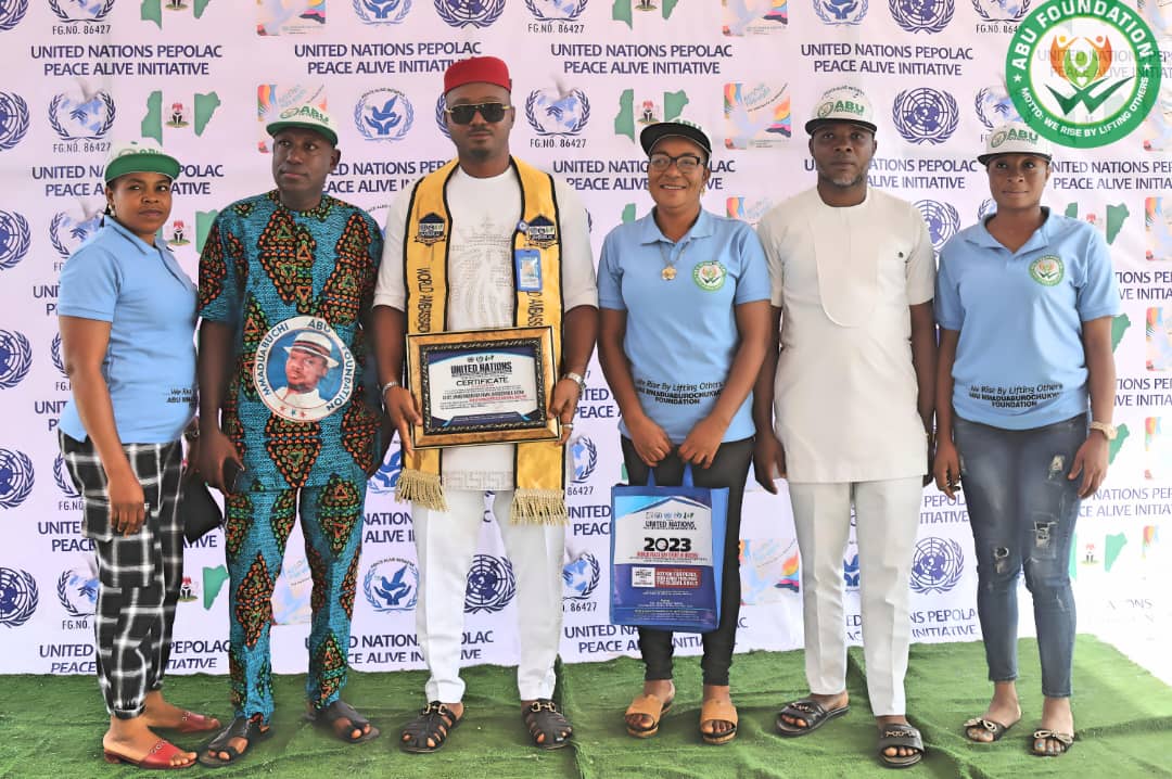 The Awardee with some some staff members of his Foundation